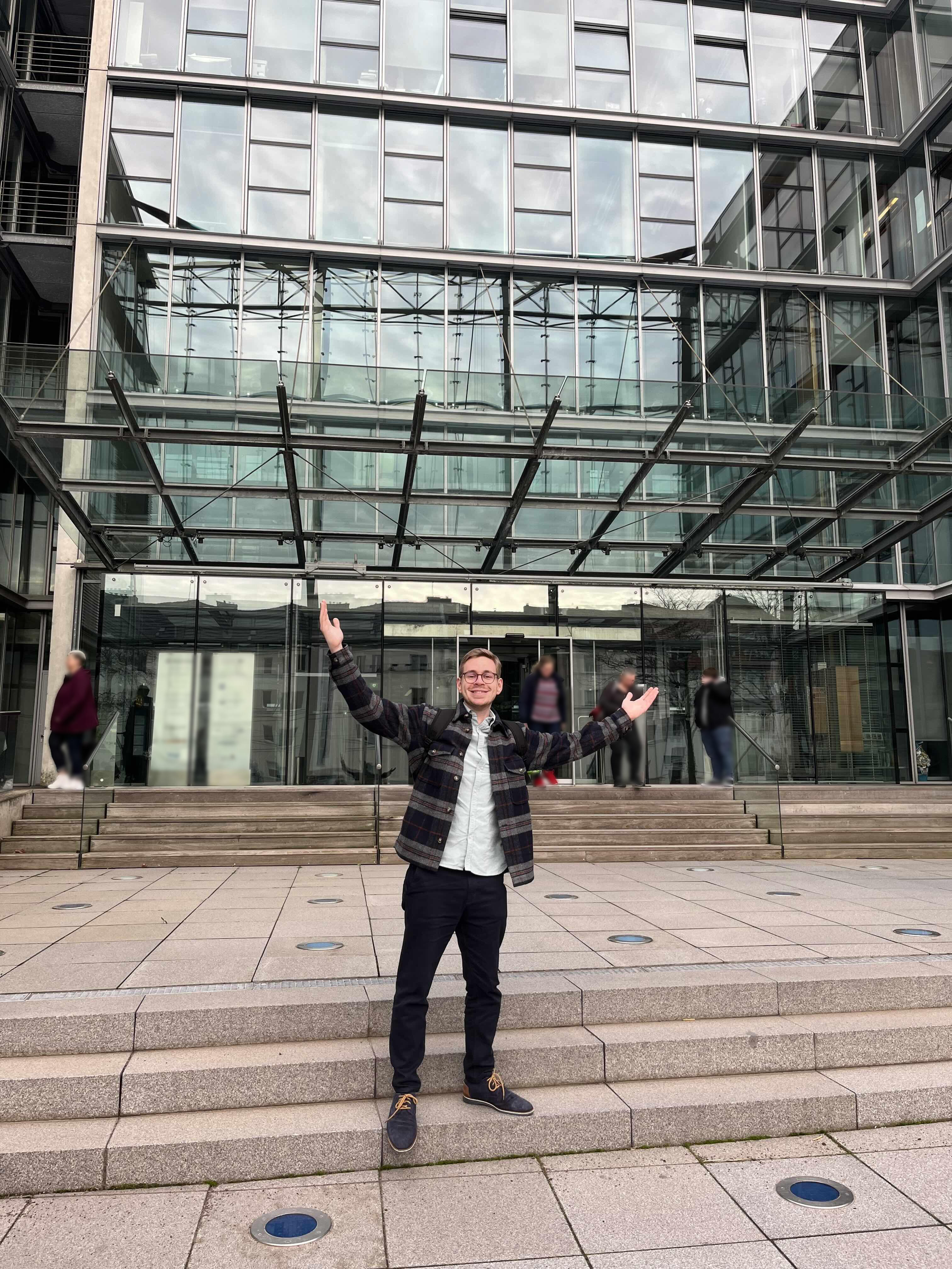 Philip infront of a building.